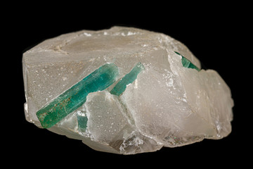 Macro tourmaline mineral stone on black background
