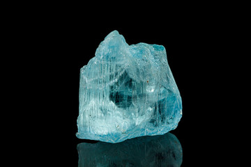Macro tourmaline mineral stone on black background