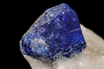 Macro of mineral stone Lazurite on a black background