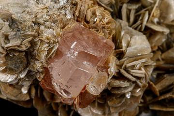 Macro stone Topaz mineral on a black background