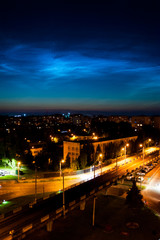 Fototapeta na wymiar The night sky is shining above the city