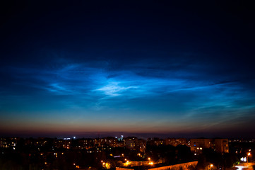 Fototapeta premium The night sky is shining above the city