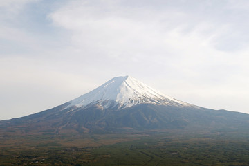 Close up top of beautiful Fuji mountain with snow cover on the top with could, Japan
