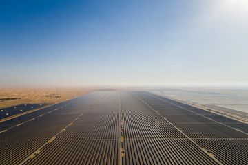Aerial view of Al Maktoum solar panel park in Saih Al Salam desert in Dubai, U.A.E.