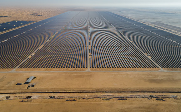 Aerial View Of Al Maktoum Solar Panel Park In Saih Al Salam Desert In Dubai, U.A.E.