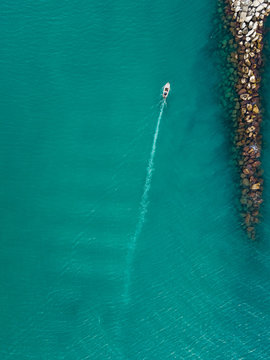 Aerial view of boat arriving to harbor in Patras, Greece