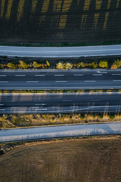 Aerial view of four roads in countryside.