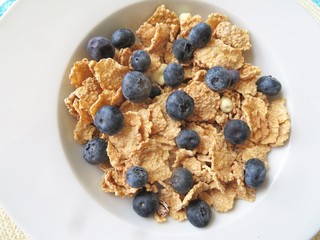 Bowl of cereal with fresh blueberries for a nutritional breakfast