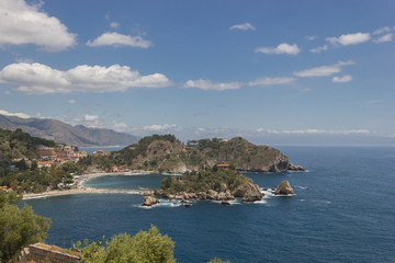 Fototapeta na wymiar Taormina Sicily panorama of famous Isola Bella, scenic coastline and blue seascape
