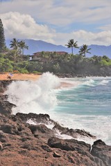 Crashing waves against a rocky coast line