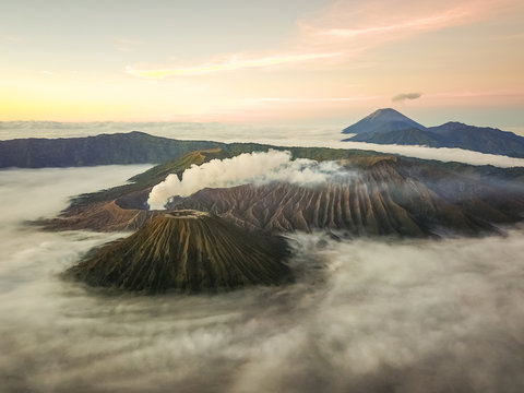 Aerial view of crater with smoke of the active volcano Bromo in Indonesia