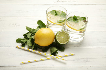 Fototapeta premium Fresh detox lemon water, healthy drink. Summer citrus lemonade.