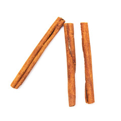 cinnamon sticks on a white background, candiedness, isolate for designers