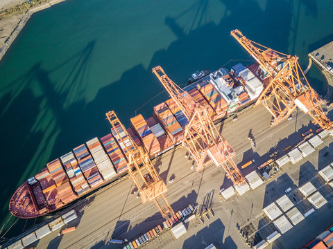 Aerial view of a merchandise boat in Tacoma harbour, Washington, USA.