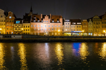 Gdansk, Poland - February 07, 2019: View of Gdansk's Main Town from the Motlawa River at night. Gdansk, Poland