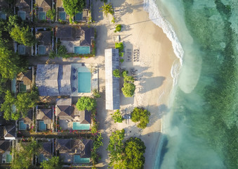 PULAU LOMBOK, INDONESIA - 7 June 2017 : Aerial view of houses on beach on Lombok Island in Indonesia.