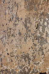 Old yellow clay wall background or texture, vintage style