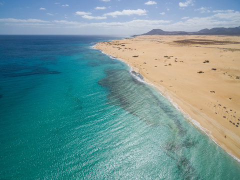 Aerial view of Corralejo?s Big Beaches with turquoise sea in Fuerteventura, Canary Islands.