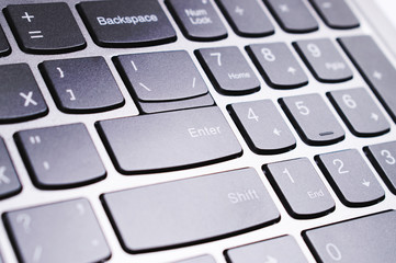 Close up of keyboard of a modern laptop.