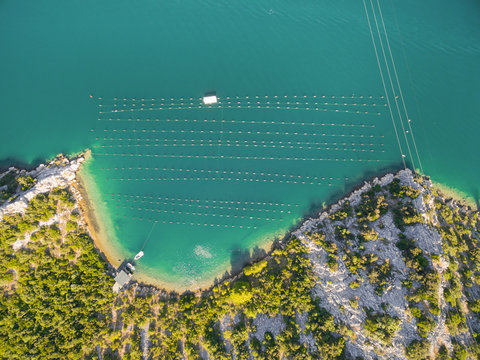 Aerial view of fishing nets in bay.