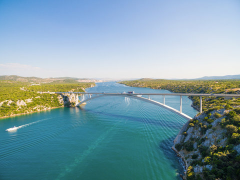 Aerial view of cars and bus driving over Sibenik bridge, Croatia.