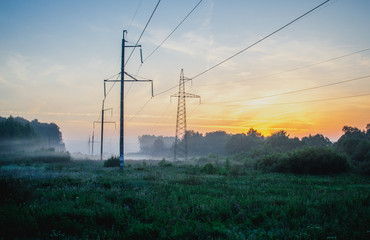 Mist under power lines early in the morning