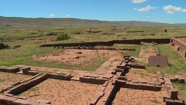 medium, high angle, tilting shot of the ancient archaeological ruins at Tiwanaku, Al Paz, Bolivia