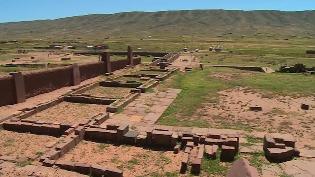 Medium high angle panning shot of the ruins at Tiwanaku, Al Paz, Bolivia