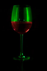 Half filled glass of wine