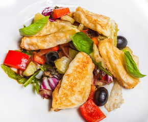 salad of fried chicken, basil, olives, pepper and onion