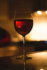 glass of red wine, blurred background