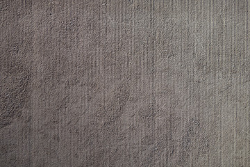 Fototapeta na wymiar grey stucco wall background with vertical line marks