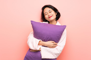 Asian young woman in pajamas