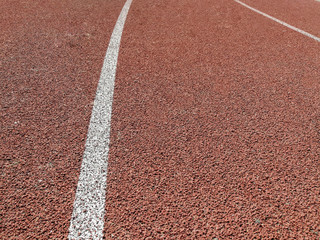 Jogging stadium surface close up