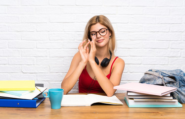 Teenager student girl at indoors scheming something