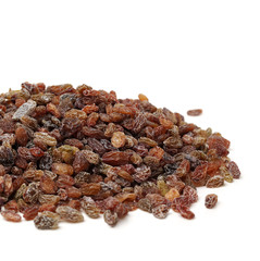 brown raisin stacked together on white background