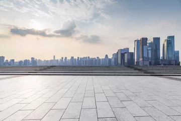 Fotobehang Panoramic skyline and modern business office buildings with empty road,empty concrete square floor © MyCreative