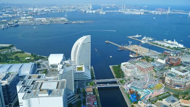 Yokohama city time lapse, high angle establishing shot of busy Japanese city harbor