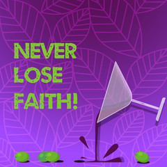 Text sign showing Never Lose Faith. Business photo text do not stop believing in someone or something or doubtful Cocktail Wine Glass Pouring Liquid with Splash Grapes and Shadow photo