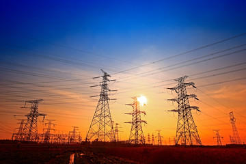 Electric tower, silhouette at sunset