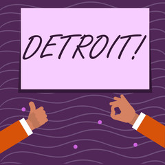 Text sign showing Detroit. Business photo showcasing City in the United States of America Capital of Michigan Motown Two Businessmen Hands Gesturing the Thumbs Up and Okay Sign for Promotion
