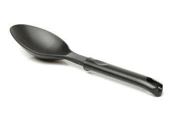 Plastic kitchen utensil on white background 