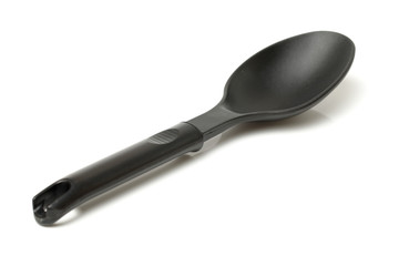 Plastic kitchen utensil on white background 