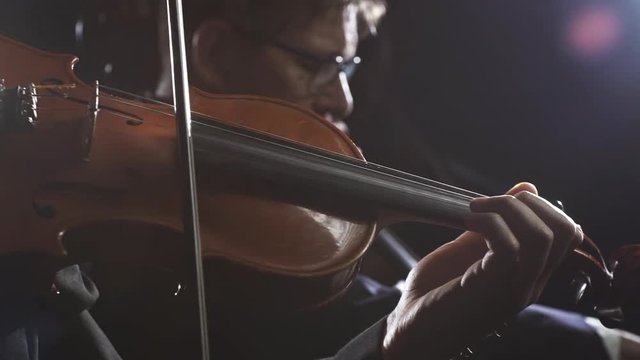 Symphonic orchestra playing on stage video montage
