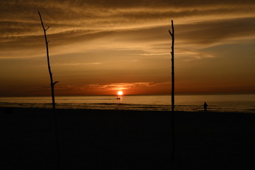 Fascinating sunset on the beach of Debki