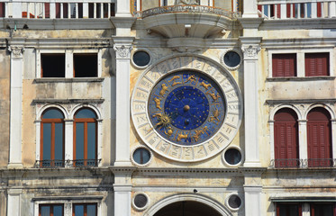 Detail from Saint Mark's Clock tower in the center of Venice with zodiac signs and roman numbers....
