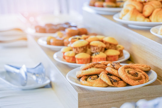 bakery ready for breakfast buffet in restaurant, in soft focus