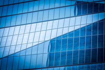 Fototapeta na wymiar background of the glass modern office building