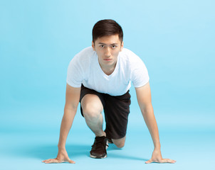 young man Runner in starting position