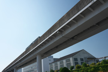 Obraz na płótnie Canvas Aichi,Japan-June 6, 2019: A guideway bus system or guided busway, Yutorito line, track near Ozone station in Nagoya, Japan